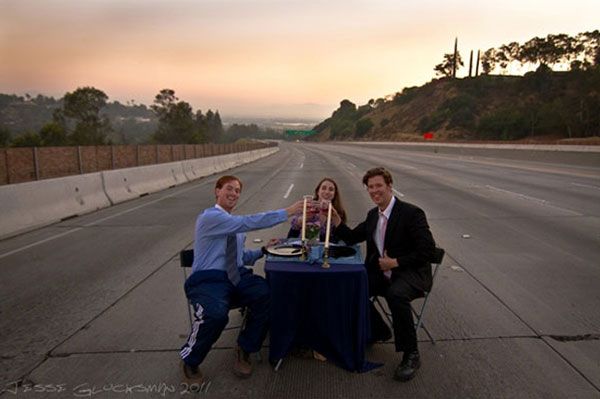 Matt Corrigan, his wife Amanda and their college friend Barry Neely pretend to dine out on the 405 freeway during the Carmageddon of July 2011.
