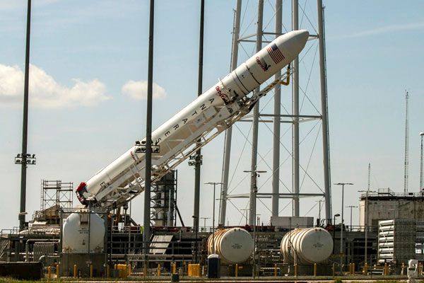 Orbital Sciences' Antares rocket is about to be poised into launch position on its pad at NASA's Wallops Flight Facility in Virginia, on September 13, 2013. Orbital Sciences' Antares rocket is about to be poised into launch position on its pad at NASA's Wallops Flight Facility in Virginia, on September 13, 2013.