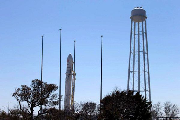 Orbital Sciences' Antares rocket is close to being raised into launch position on its pad at NASA's Wallops Flight Facility in Virginia, on April 6, 2013. Orbital Sciences' Antares rocket is close to being raised into launch position on its pad at NASA's Wallops Flight Facility in Virginia, on April 6, 2013.