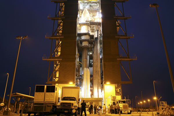 Work continues being done on the Atlas V rocket, which carries the Mars Science Laboratory spacecraft onboard, at Cape Canaveral Air Force Station in Florida on November 17, 2011.