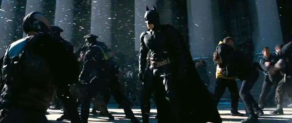 Batman (Christian Bale) gets ready to brawl as Bane approaches in THE DARK KNIGHT RISES.