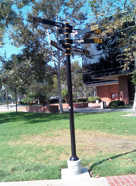 A new signpost at CSULB...showing the distance to different cities around the world.