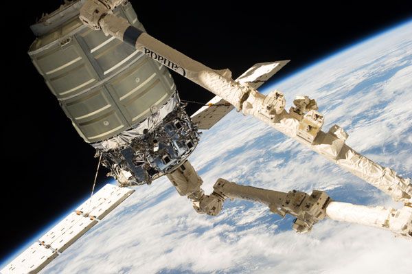 The ISS' robotic arm grapples Cygnus Orb-D1 prior to it berthing at the outpost on September 29, 2013. The ISS' robotic arm grapples Cygnus Orb-D1 prior to it berthing at the outpost on September 29, 2013.