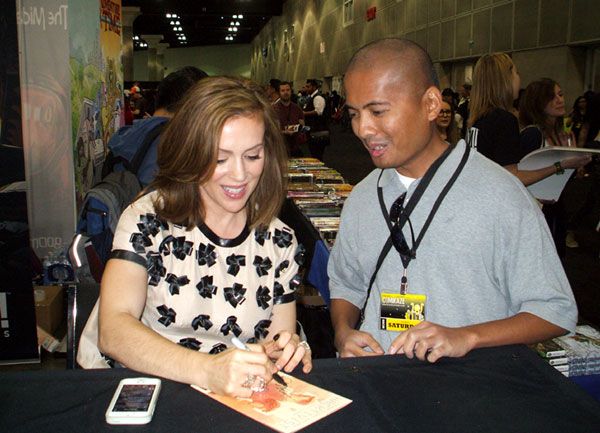 Getting an autograph by Alyssa Milano at Stan Lee's Comikaze Expo in downtown Los Angeles, on November 2, 2013.