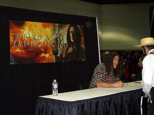 'Weird Al' Yankovic signs autographs at Stan Lee's Comikaze Expo in downtown Los Angeles, on November 2, 2013.