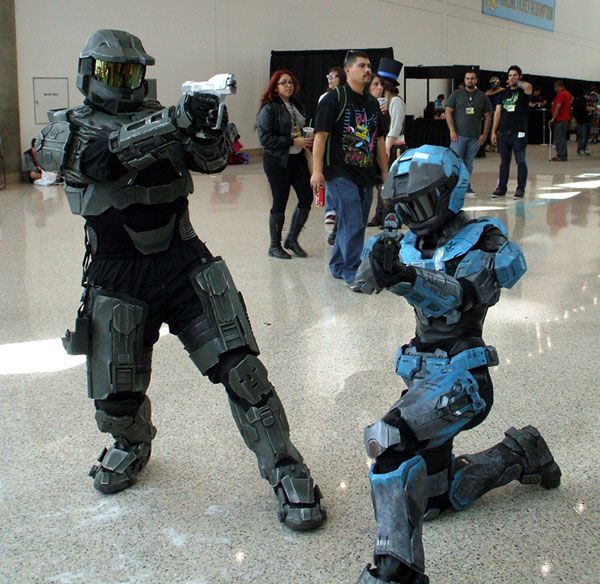 Two fans dressed up as Spartans from the Xbox video game HALO strike a pose at Stan Lee's Comikaze Expo in downtown Los Angeles, on November 2, 2013.