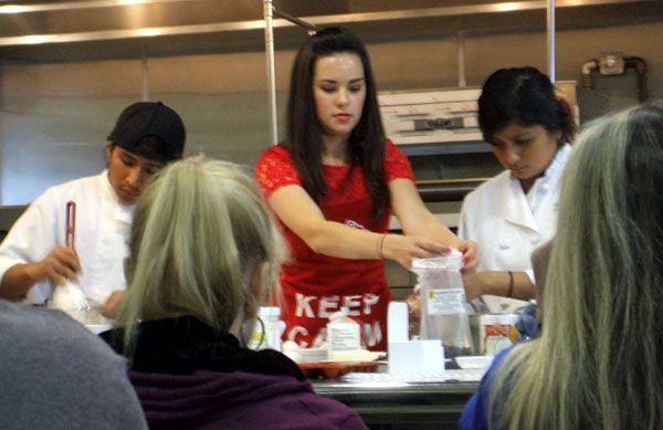 Whitney Miller conducts a cooking demo in Costa Mesa, California, on February 9, 2013.