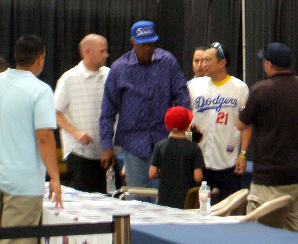 Dr. J is about to leave after doing an autograph signing at the Frank & Son Collectible Show in City of Industry, California...on August 10, 2013.