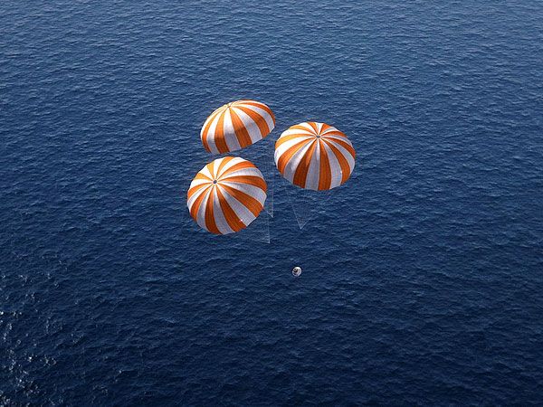 A computer-generated image depicting the Orion spacecraft as it is about to splash down into the Pacific Ocean following parachute deployment...concluding Exploration Mission 1 in 2017. A computer-generated image depicting the Orion spacecraft as it is about to splash down into the Pacific Ocean following parachute deployment...concluding Exploration Mission 1 in 2017.