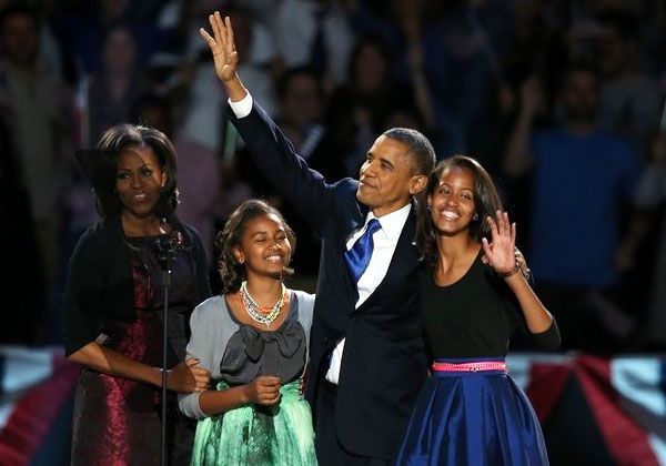 With his family at his side, President Obama gives his victory speech in Chicago, his hometown, after winning the national election on November 6, 2012.
