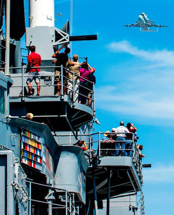 Endeavour and NASA 905 fly over the retired battleship USS Iowa in San Pedro on September 21, 2012.