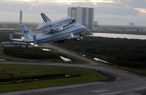 The orbiter Endeavour, mated atop NASA 905, departs from Kennedy Space Center for the final time on September 19, 2012.