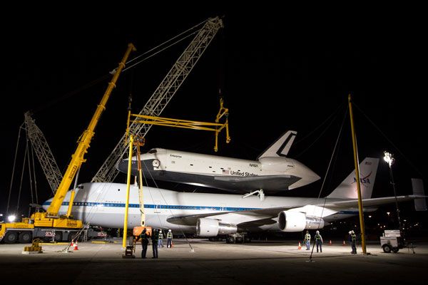 At JFK International Airport, Enterprise is about to be demated from NASA 905 during the night of May 12, 2012.