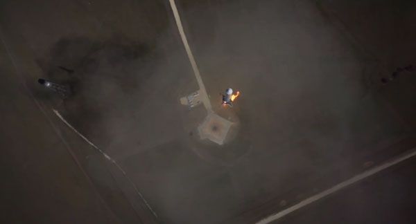 As the unmanned Hexacopter hovers nearby, the Grasshopper test vehicle is about to touch down on its pad after reaching an altitude of 744 meters (2,441 feet) above McGregor, Texas, on October 7, 2013. As the unmanned Hexacopter hovers nearby, the Grasshopper test vehicle is about to touch down on its pad after reaching an altitude of 744 meters (2,441 feet) above McGregor, Texas, on October 7, 2013.