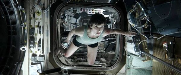 After removing her spacesuit, Ryan Stone floats through the International Space Station in GRAVITY. After removing her spacesuit, Ryan Stone floats through the International Space Station in GRAVITY.