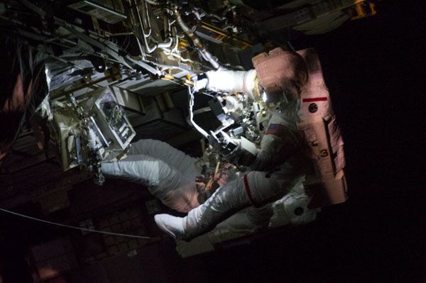 The International Space Station crosses into the Earth's night side as Expedition 35 crew members Chris Cassidy and Tom Marshburn conduct a spacewalk outside of the orbital outpost, on May 11, 2013. The International Space Station crosses into the Earth's night side as Expedition 35 crew members Chris Cassidy and Tom Marshburn conduct a spacewalk outside of the orbital outpost, on May 11, 2013.