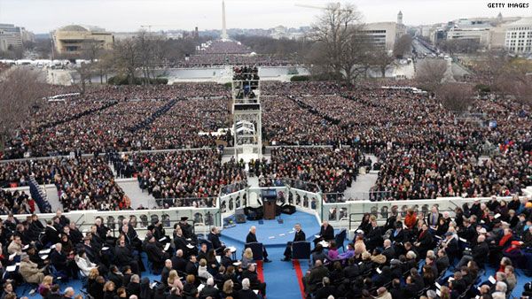 Hundreds of thousands of people gather at Capitol Hill to watch the Presidential Inauguration take place on January 21, 2013.