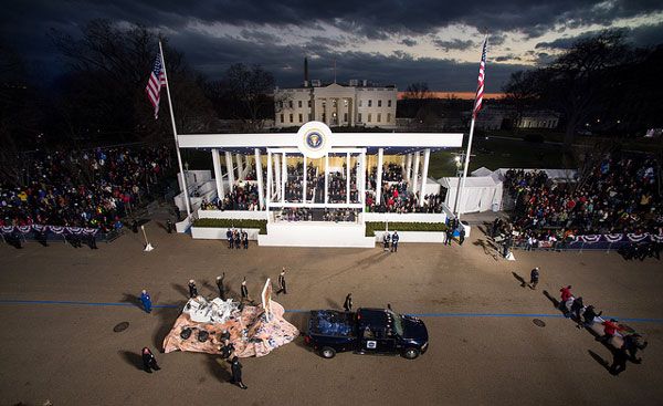 With the White House in the background, the full-size replica of NASA's Curiosity Mars rover passes by the Presidential viewing stand during the Inaugural Parade...on January 21, 2013.