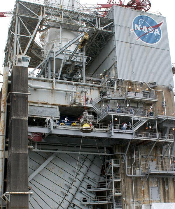 Workers at NASA's Stennis Space Center in Mississippi prepare to place the J-2X engine onto the A-2 Test Stand for a second round of testing...in early 2012. Workers at NASA's Stennis Space Center in Mississippi prepare to place the J-2X engine onto the A-2 Test Stand for a second round of testing...in early 2012.