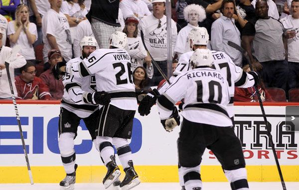 The Los Angeles Kings celebrate after defeating the Phoenix Coyotes and winning the NHL Western Conference championship, on May 22, 2012.