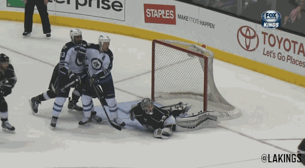 The Los Angeles Kings' Jonathan Quick blocks the puck after it was shot by the Winnipeg Jets' Blake Wheeler at STAPLES Center...on March 29, 2014.