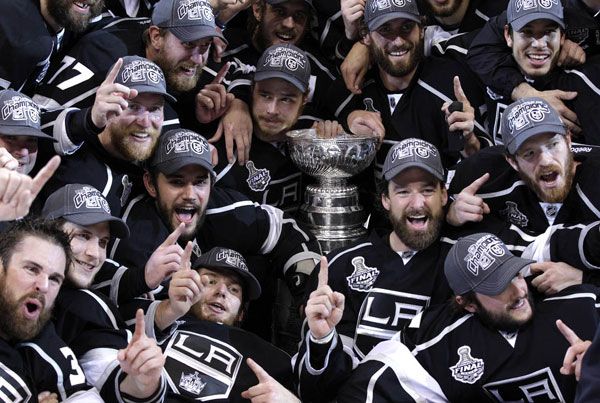 Los Angeles Kings players pose for a group photo after they clinch the team's very first Stanley Cup title on June 11, 2012.