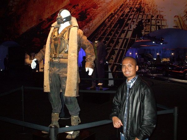 Posing with the Bane outfit worn by Tom Hardy in THE DARK KNIGHT RISES, on December 7, 2012.