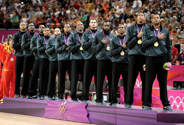 The U.S. men's basketball team celebrates with gold medals after defeating Spain, 107-100, on August 12, 2012.