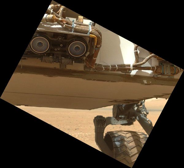 A MAHLI image of the Curiosity rover's underbelly and two hazard avoidance cameras, taken on September 9, 2012.