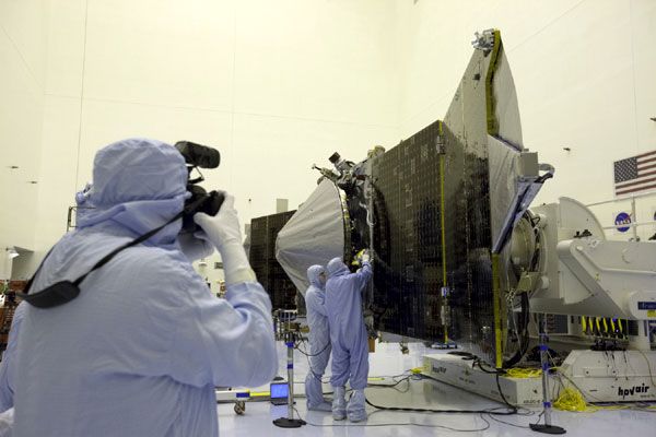 NASA's MAVEN spacecraft is put on display for the media to see at the Kennedy Space Center in Florida, on September 27, 2013.