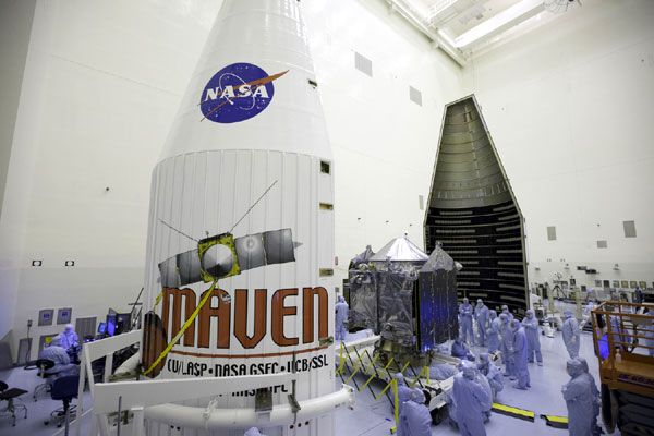 At NASA's Kennedy Space Center in Florida, the MAVEN spacecraft is about to be encapsulated within its Atlas V payload fairing...on November 2, 2013.