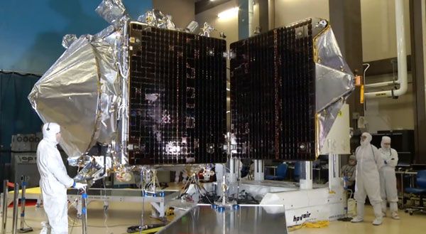 NASA's MAVEN spacecraft deploys its twin solar arrays during testing at Lockheed Martin Space Systems Company in Colorado.