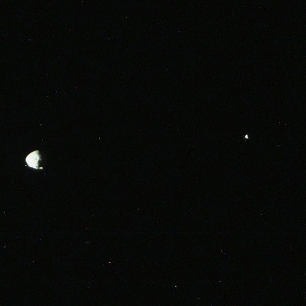 A night photo of Phobos (left) and Deimos taken by the Curiosity rover on the surface of Mars...in August of 2013.