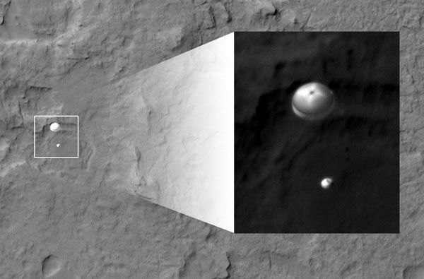NASA's Mars Reconnaissance Orbiter photographs Curiosity before it lands on the Martian surface.