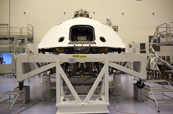 The Curiosity Mars rover and its descent stage are enclosed by the backshell at NASA's Kennedy Space Center in Florida.