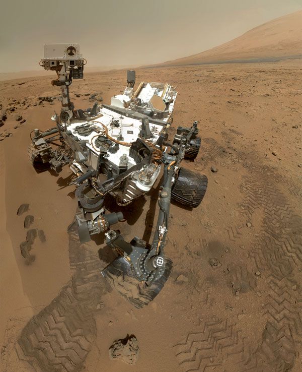 A self-portrait of NASA's Curiosity Mars rover, taken with a camera on her robotic arm on October 31, 2012. Mount Sharp lays in the background.