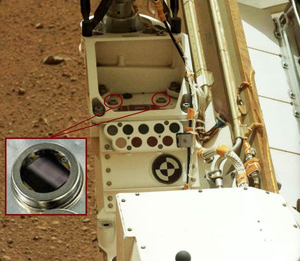 An image of the two microchips bearing the names of 1.25 million people on the surface of Mars.