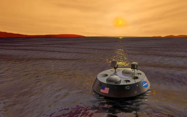 An artist's concept of the Titan Mare Explorer floating in a lake on Saturn's moon Titan.