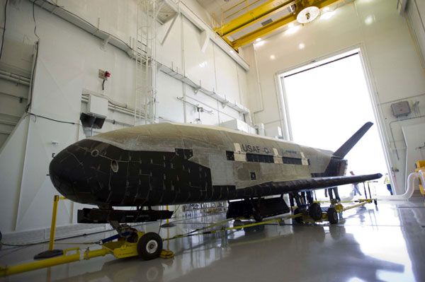 OTV-2 is towed into a hangar at Vandenberg Air Force Base, California, after returning home from space on June 16, 2012.