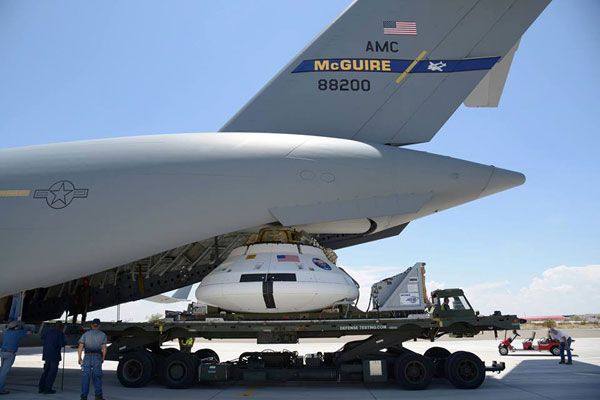 An Orion test vehicle is loaded onto a C-17 aircraft prior to the spacecraft's parachute test above the U.S. Army's Yuma Proving Grounds in Arizona, on July 24, 2013. An Orion test vehicle is loaded onto a C-17 aircraft prior to the spacecraft's parachute test above the U.S. Army's Yuma Proving Grounds in Arizona, on July 24, 2013.