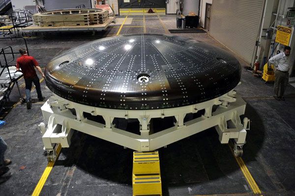 On March 25, 2013, the heat shield carrier structure for the Orion EFT-1 vehicle awaits transportation from Lockheed Martin's Denver facility to Textron Defense Systems in Boston, Massachusetts...for application of the AVCOAT thermal protection material. On March 25, 2013, the heat shield carrier structure for the Orion EFT-1 vehicle awaits transportation from Lockheed Martin's Denver facility to Textron Defense Systems in Boston, Massachusetts...for application of the AVCOAT thermal protection material.