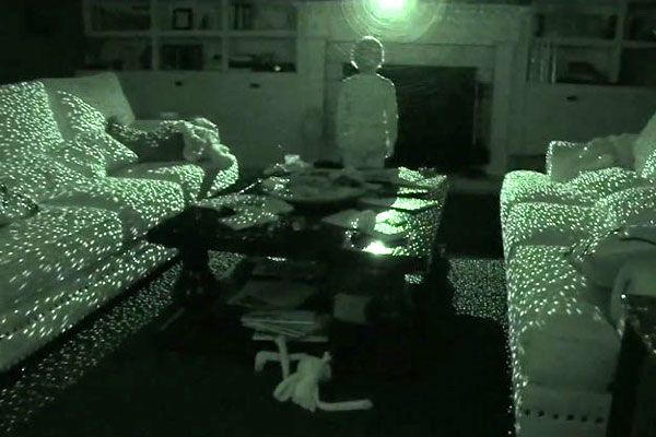 Robbie (Brady Allen) communicates with a mysterious entity in PARANORMAL ACTIVITY 4. Robbie (Brady Allen) communicates with a mysterious entity in PARANORMAL ACTIVITY 4.