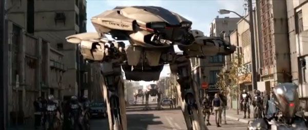 A squad of ED-209s patrols the streets with cybernetic police officers in 2014's ROBOCOP. A squad of ED-209s patrols the streets with cybernetic police officers in 2014's ROBOCOP.