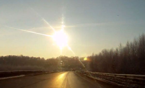 A meteor—believed to be a small asteroid by NASA—enters the atmosphere and explodes above Chelyabinsk, Russia, on February 15, 2013.