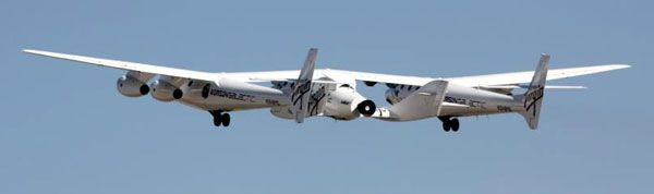With SpaceShipTwo attached beneath her, White Knight II takes off for another glide test above California's Mojave Desert on April 12, 2013. With SpaceShipTwo attached beneath her, White Knight II takes off for another glide test above California's Mojave Desert on April 12, 2013.