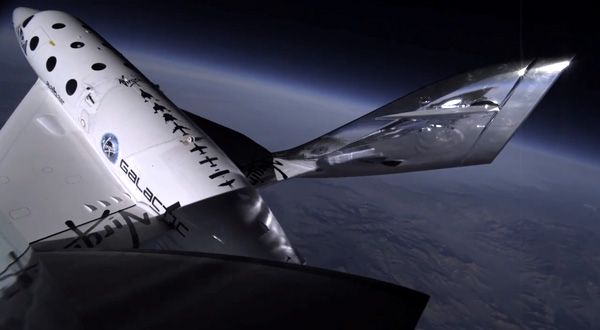 SS2 adjusts her feathered reentry system as she prepares to return to the Mojave Air and Spaceport following a third successful powered flight on January 10, 2014. SS2 adjusts her feathered reentry system as she prepares to return to the Mojave Air and Spaceport following a third successful powered flight on January 10, 2014.