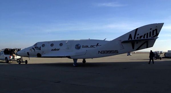 SS2 is towed down the tarmac after safely returning to the Mojave Air and Spaceport, following a third successful powered flight on January 10, 2014. SS2 is towed down the tarmac after safely returning to the Mojave Air and Spaceport, following a third successful powered flight on January 10, 2014.