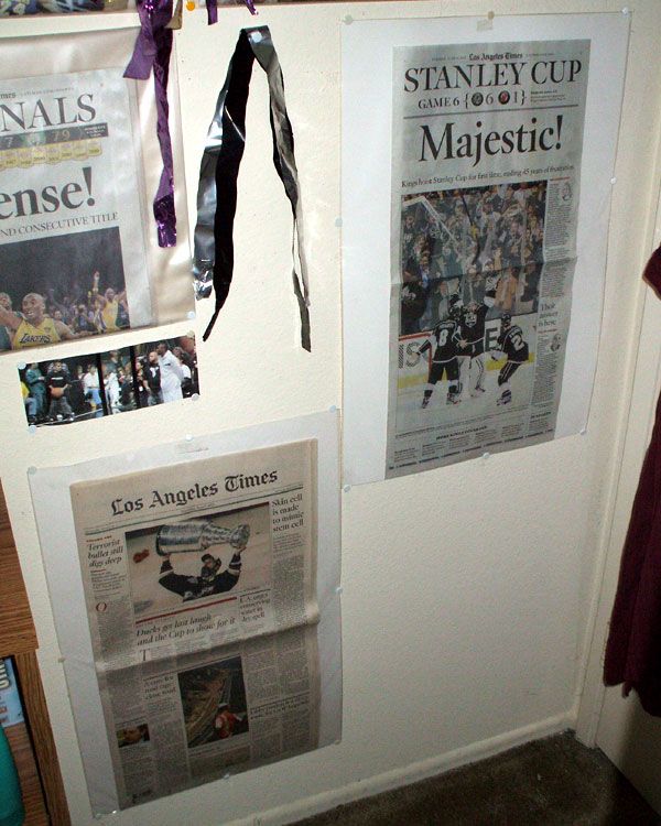 The Los Angeles Times front and sports pages commemorating the Anaheim Ducks and L.A. Kings' Stanley Cup victories.