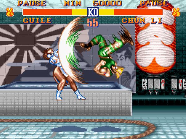 Guile Flash Kicks Chun-Li in STREET FIGHTER II.