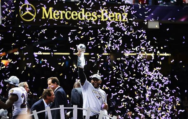 The Ravens' Ray Lewis celebrates with the Lombardi Trophy after his team won 34-31 against the San Francisco 49ers in Super Bowl XLVII, on February 3, 2013.
